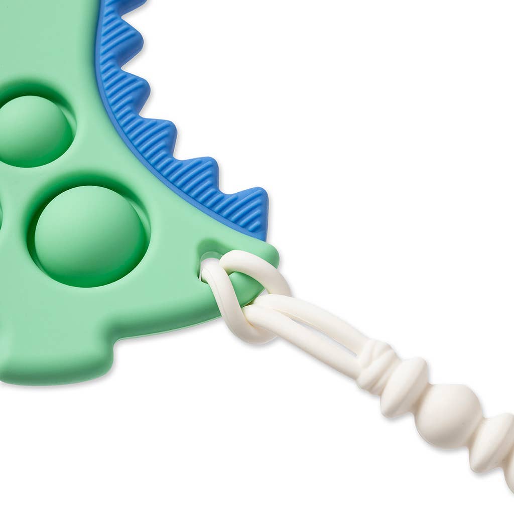 Dino Jouet à bouton-pression + Dentition Itzy Pop™