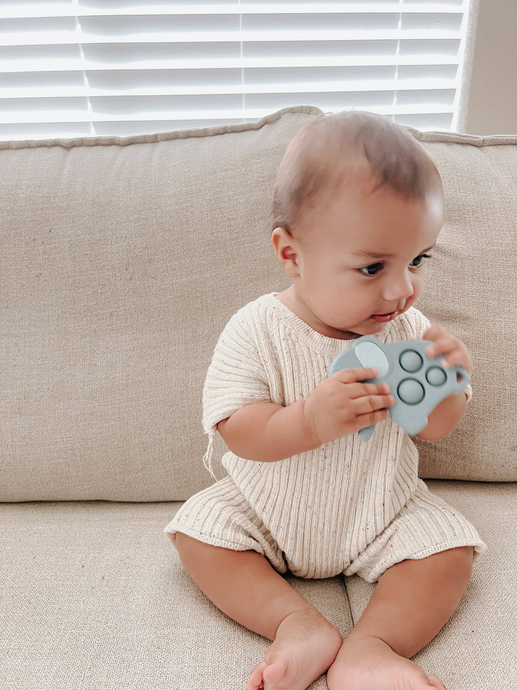 Dino Jouet à bouton-pression + Dentition Itzy Pop™